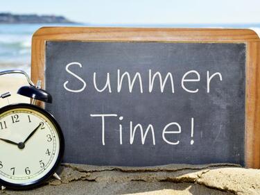 Summer Time sign on the beach