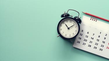 Early Dismissal Picture of a clock and calendar