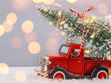Red toy truck with Christmas tree