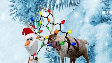 snowman and raindeer with christmas lights