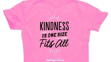 pink shirt with saying "Kindness is one size fits all"