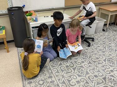 students sitting and reading